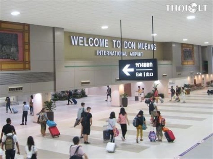 Which Bangkok airport is closer to the city?
