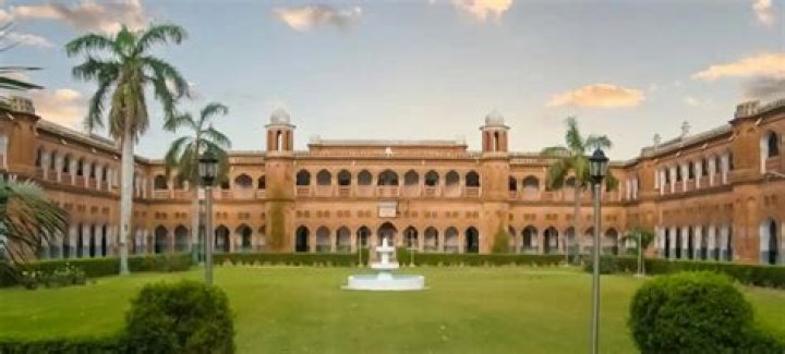 Who is the first principal of Aligarh College?