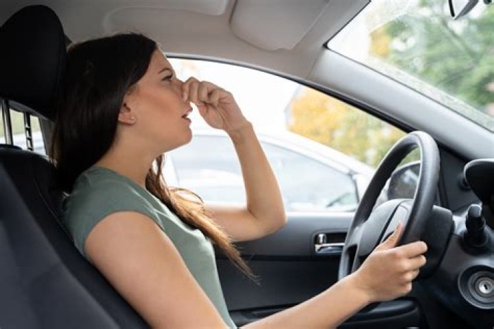 Why does my car smell like gas in the garage?