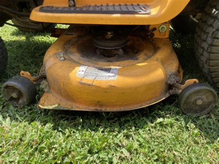 Why does my riding lawn mower cut uneven?